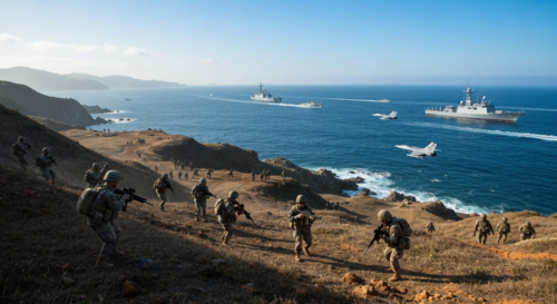 A photorealistic image of military forces from different nations conducting a joint exercise in a Pacific coastal area, with ships and aircraft in the background, under a clear sky, showcasing teamwor